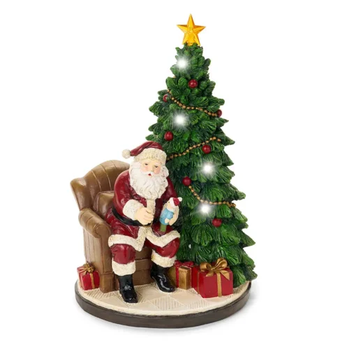 Nuvole di Stoffa Babbo Natale su poltrona con albero LED in resina 30 cm