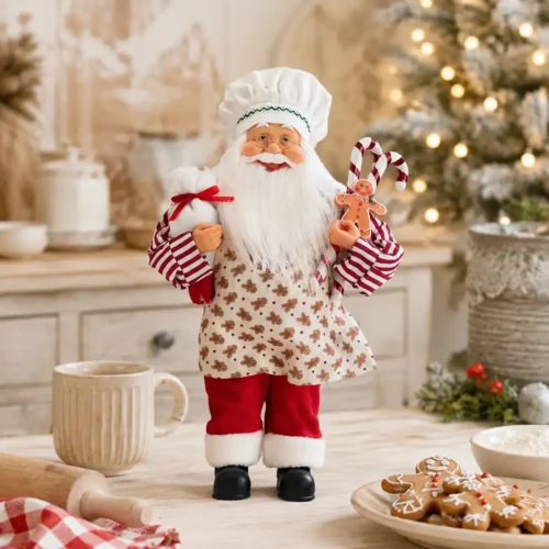 Babbo Natale cuoco Timstor in una cucina decorata a tema gingerbread