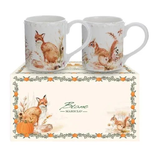 Set de deux mugs Blanc Mariclò Octavia avec écureuil et renard, présentés sur boîte cadeau automnale.