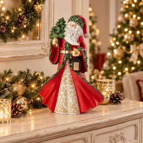 Babbo Natale Fiori di Lena in resina rosso con albero e lanterna, decorazione natalizia da consolle alta 47 cm.